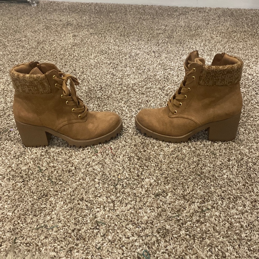 Ankle boots. Tan never been wore. Me too is the brand